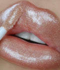 ULTRA Dazzle LIPGLOSS BeautyCreations tono hot shot
